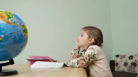 Stock Video Bored Little Girl Puts Head Down On Table Live Wallpaper For PC - Free Live Wallpaper