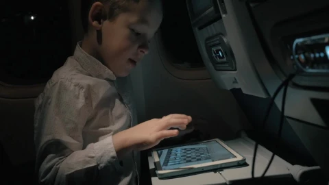 Stock Video Bored Child On A Flight Live Wallpaper For PC - Free Live Wallpaper