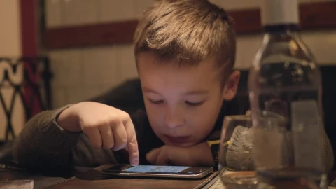 Stock Video Bored Boy Using A Phone In A Cafe Live Wallpaper For PC - Free Live Wallpaper