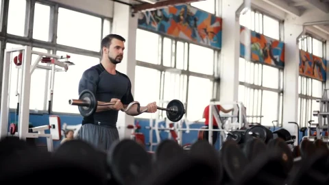 Stock Video Bodybuilder Exercising His Biceps In The Gym Live Wallpaper For PC - Free Live Wallpaper