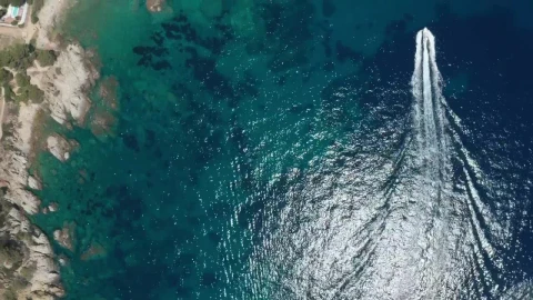 Stock Video Boat Sailing Along A Rocky Coastline Live Wallpaper For PC - Free Live Wallpaper