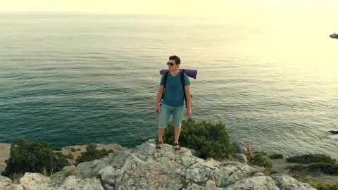 Video Stock Climbed Man On The Rocky Seashore Live Wallpaper For PC - Free Live Wallpaper