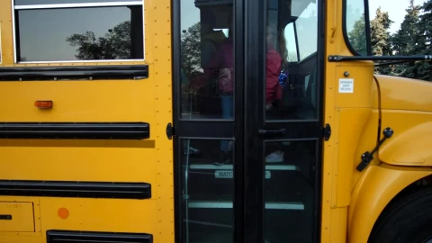 Video Stock Children Getting Off A Yellow School Bus Live Wallpaper For PC - Free Live Wallpaper