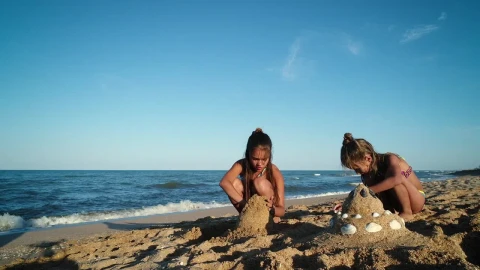 Video Stock Children Forming Sand Pyramids On The Beach Live Wallpaper For PC - Free Live Wallpaper