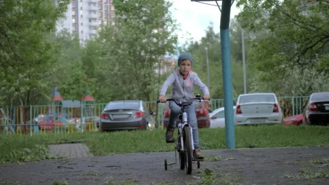 Video Stock Child With Training Wheels On Their Bike Live Wallpaper For PC - Free Live Wallpaper