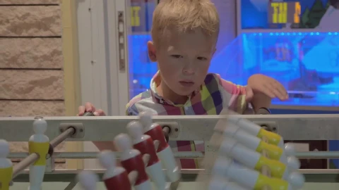 Video Stock Child Watching A Game Of Table Football Live Wallpaper For PC - Free Live Wallpaper