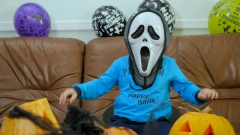 Video Stock Child In Scream Halloween Mask Makes Spooky Hand Gestures Live Wallpaper For PC - Free Live Wallpaper