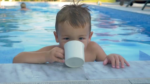 Video Stock Child Drinking From A Cup In The Pool Live Wallpaper For PC - Free Live Wallpaper