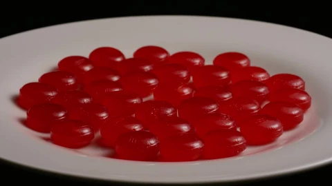 Video Stock Cherry Candies On A Slowly Rotating Plate Live Wallpaper For PC - Free Live Wallpaper