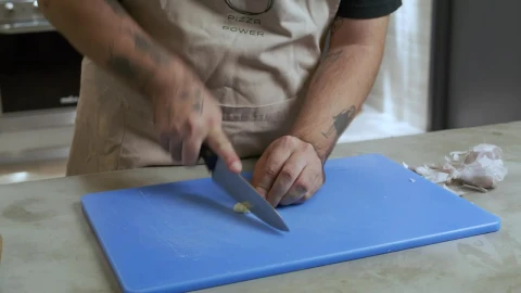 Video Stock Chef Skillfully Mincing A Garlic Live Wallpaper For PC - Free Live Wallpaper