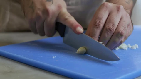 Video Stock Chef Skillfully Chopping Garlic Live Wallpaper For PC - Free Live Wallpaper
