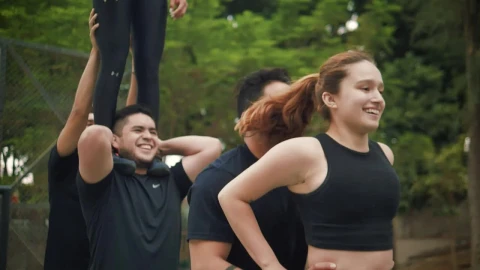 Video Stock Cheerleader Man Lifting A Girl With His Hands Live Wallpaper For PC - Free Live Wallpaper