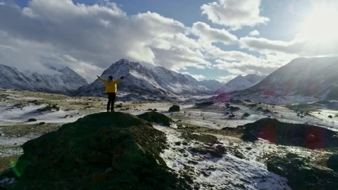Video Stock Cheerful Man Raising Arms Surrounded By Mountains Live Wallpaper For PC - Free Live Wallpaper