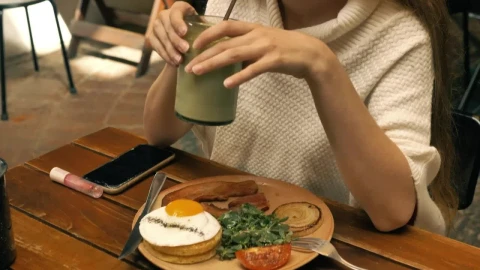 Video Stock Cheerful Girl Chatting With Another Person In A Restaurant Live Wallpaper For PC - Free Live Wallpaper
