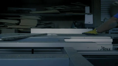 Video Stock Carpenter Cutting A Board On A Table With A Saw Live Wallpaper For PC - Free Live Wallpaper