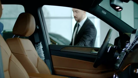 Video Stock Car Dealer Showing The Car To A Client Live Wallpaper For PC - Free Live Wallpaper