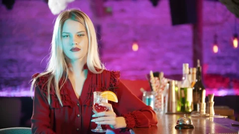 Video Stock Captivating Woman With A Drink At A Bar Counter Live Wallpaper For PC - Free Live Wallpaper