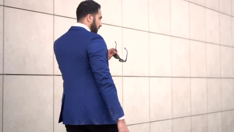 Video Stock Businessman Wearing Sunglasses Walking Live Wallpaper For PC - Free Live Wallpaper