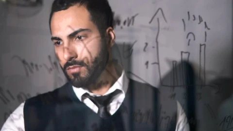 Video Stock Businessman Thinks Up Solution With Writing On Glass Live Wallpaper For PC - Free Live Wallpaper