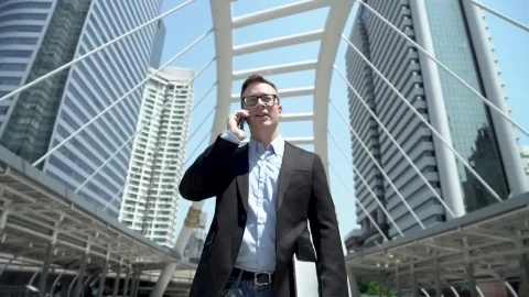 Video Stock Businessman On A Call On The Street Live Wallpaper For PC - Free Live Wallpaper
