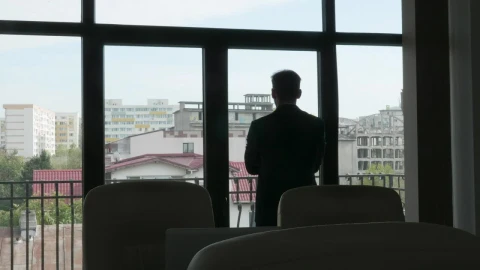 Video Stock Businessman Looking Out The Window Live Wallpaper For PC - Free Live Wallpaper