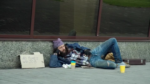 Video Stock Businessman Giving Money To Homeless Man Live Wallpaper For PC - Free Live Wallpaper