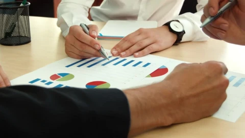 Video Stock Businessman Discussing Business Charts Live Wallpaper For PC - Free Live Wallpaper