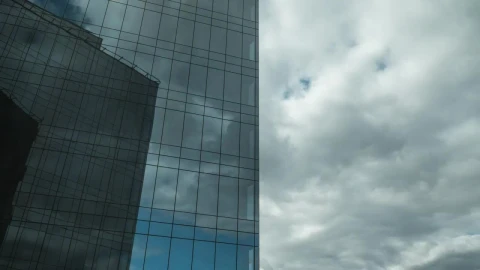 Video Stock Clouds Moving Above A Glass Skyscraper Live Wallpaper For PC - Free Live Wallpaper