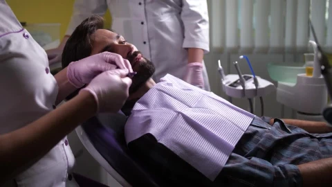 Stock Video Dentist Working With A Male Patient Live Wallpaper For PC - Free Live Wallpaper