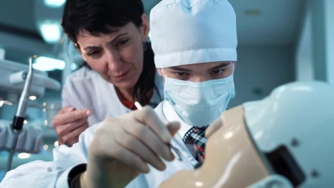 Stock Video Dentist Student Practicing On A Dummy Live Wallpaper For PC - Free Live Wallpaper