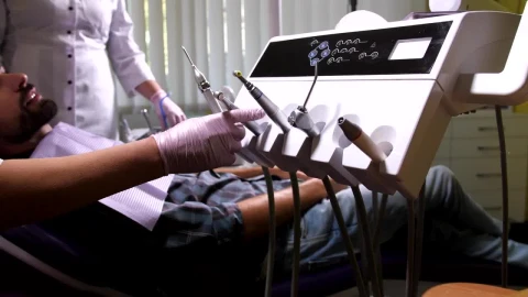 Stock Video Dentist Selecting A Drill Live Wallpaper For PC - Free Live Wallpaper