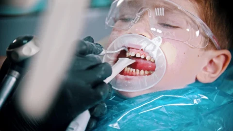 Stock Video Dentist Fixing A Childs Teeth Live Wallpaper For PC - Free Live Wallpaper