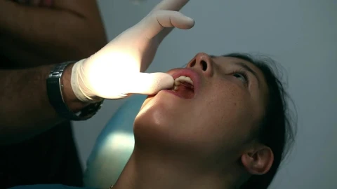 Stock Video Dentist Applying A Surgical Procedure Live Wallpaper For PC - Free Live Wallpaper