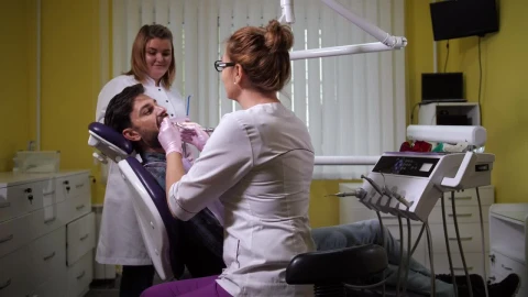 Stock Video Dental Assistant Working With A Patient Live Wallpaper For PC - Free Live Wallpaper