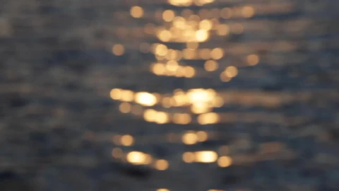 Stock Video Defocused View Of The Sunset Reflection In The Sea Live Wallpaper For PC - Free Live Wallpaper