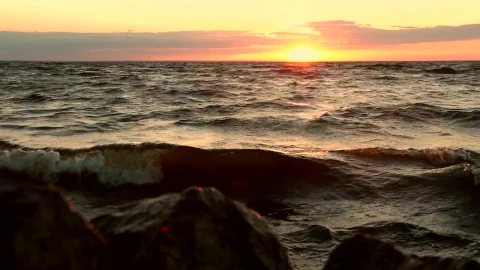 Stock Video Deep Waves And An Orange Sunset Live Wallpaper For PC - Free Live Wallpaper