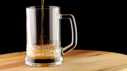 Stock Video Dark Beer Poured Into A Transparent Mug Live Wallpaper For PC - Free Live Wallpaper