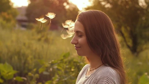 Stock Video Dandelion Seeds Fall On The Face Of A Happy Woman Live Wallpaper For PC - Free Live Wallpaper