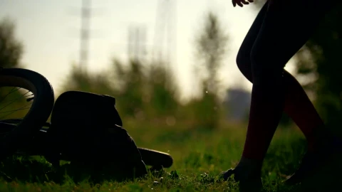 Stock Video Cyclist Woman Pulls Out Of The Backpack A Water Bottle Live Wallpaper For PC - Free Live Wallpaper