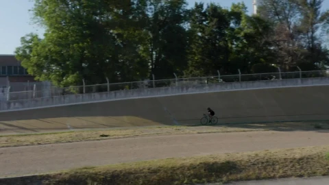 Stock Video Cyclist Traveling On A Track Outside Live Wallpaper For PC - Free Live Wallpaper