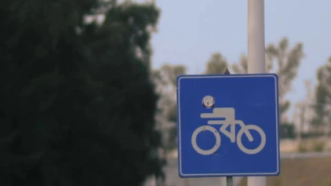 Stock Video Cyclist Sign Next To A Road Vertical Shot Live Wallpaper For PC - Free Live Wallpaper