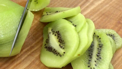Stock Video Cutting Up Kiwi On A Table Live Wallpaper For PC - Free Live Wallpaper
