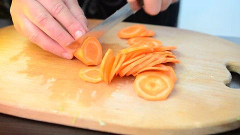 Stock Video Cutting Up Carrots On A Chopping Board Live Wallpaper For PC - Free Live Wallpaper