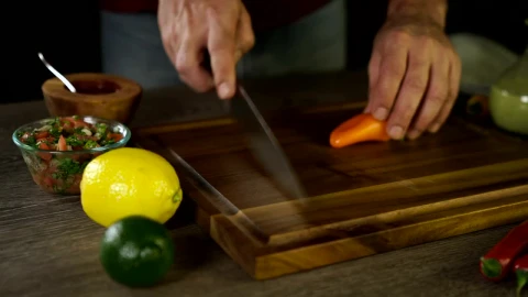 Stock Video Cutting Up An Orange Pepper Live Wallpaper For PC - Free Live Wallpaper