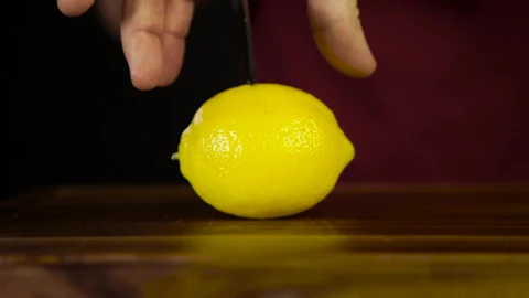 Stock Video Cutting Through A Lemon With A Knife Live Wallpaper For PC - Free Live Wallpaper