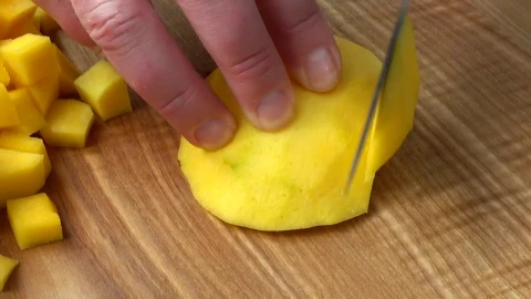 Stock Video Cutting Mango On A Board Close Up Live Wallpaper For PC - Free Live Wallpaper