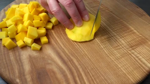 Stock Video Cutting Mango Cubes On A Board Live Wallpaper For PC - Free Live Wallpaper