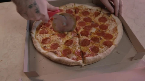 Stock Video Cutting A Pizza With A Special Slicer Live Wallpaper For PC - Free Live Wallpaper