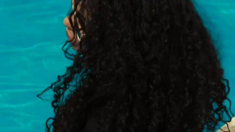 Stock Video Curly Haired Girl At A Pool Wearing Sunglasses Live Wallpaper For PC - Free Live Wallpaper