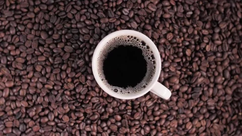 Stock Video Cup Of Coffee On Top Of Coffee Beans Live Wallpaper For PC - Free Live Wallpaper